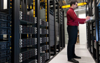 a network services professional working on a server
